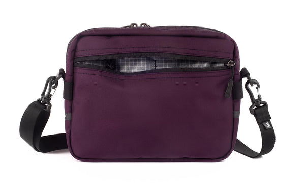 The Side Kick in Aubergine (dark purple) 525 Ballistic with an Northwest Sky (light grey with white grid) 200 Halcyon interior.